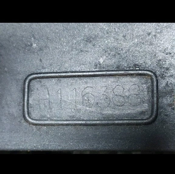 Levers, carriage and black textured paint of a Soviet arithmometer – detail 7