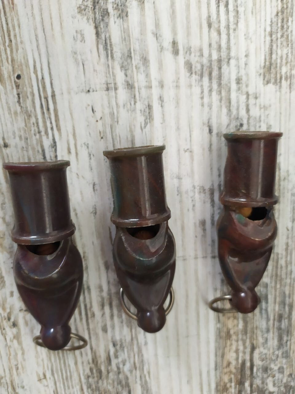 Soviet carbolite whistle with molded loop and metal split ring
