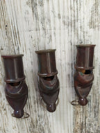 Soviet carbolite whistle with molded loop and metal split ring