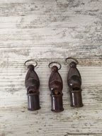 Red Army collectibles: three vintage USSR signal whistles side by side