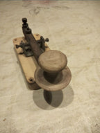 Vintage telegraph key with rimmed handle and adjustment screws