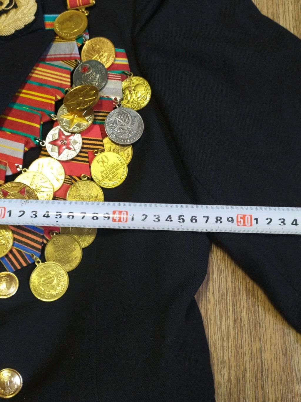 Multi-row medal bar and breast badges on the Soviet naval tunic – detail 13