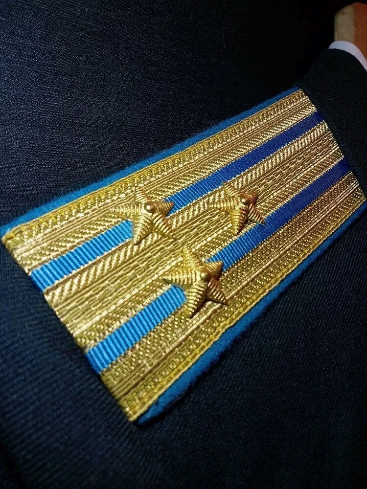 Multi-row medal bar and breast badges on the Soviet naval tunic