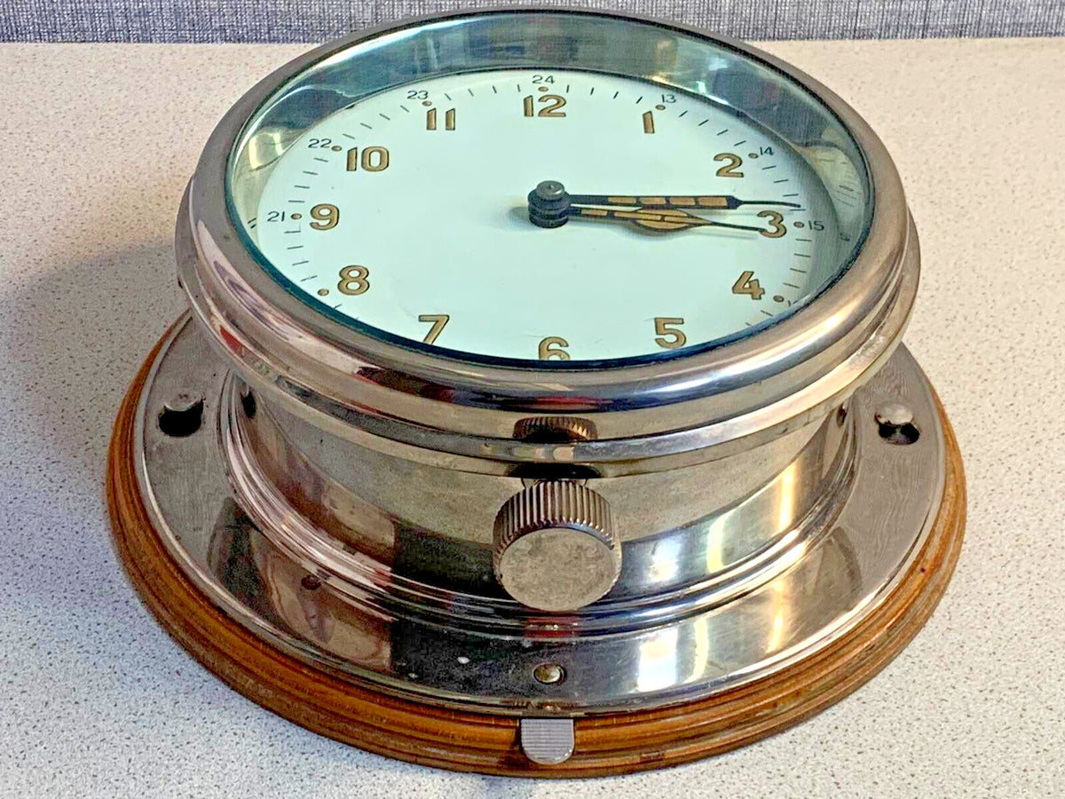 Soviet navy ship clock by Vostok dated 1948 with bottom winding and red seconds hand