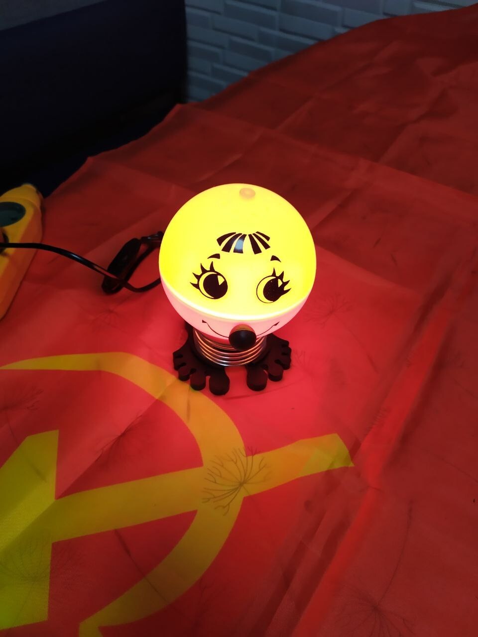 Soviet night light Kolobok with yellow dome, spring neck and stylized feet