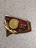 Soviet October Revolution pin with USSR flag and laurel wreath in enamel