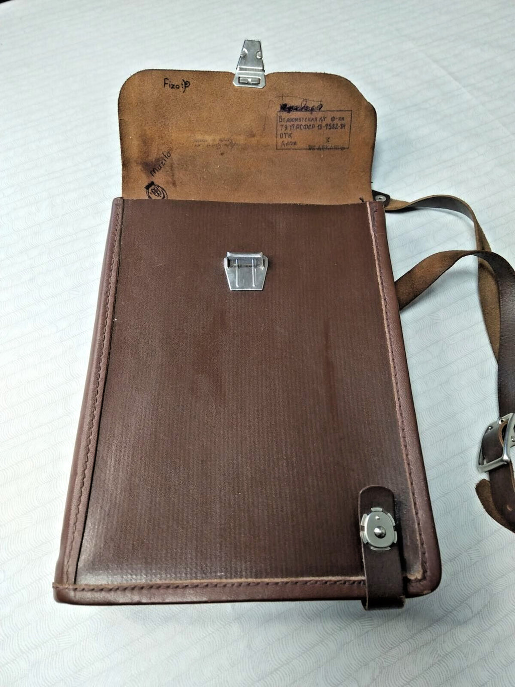 Soldier art drawings on the inner side of the field bag flap