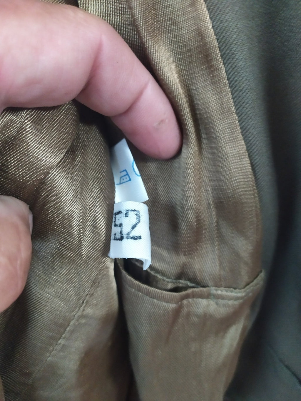 Small holes in the satin lining of the 1980s Soviet officer coat – detail 10