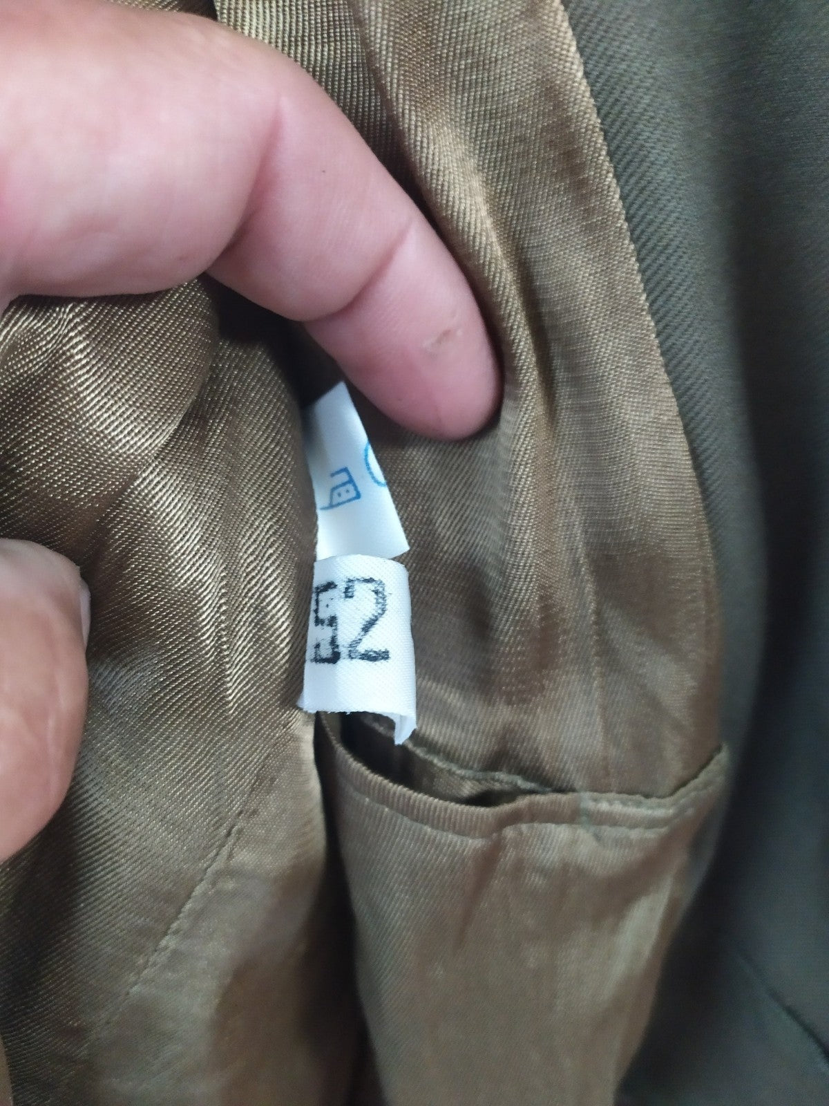 Small holes in the satin lining of the 1980s Soviet officer coat – detail 10
