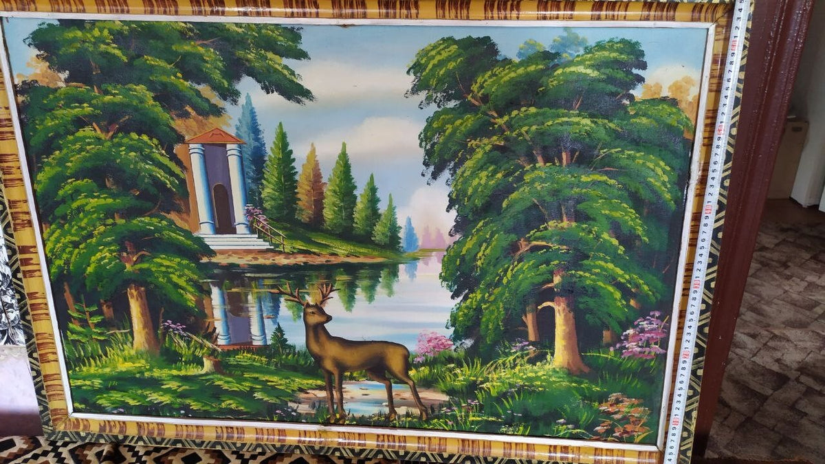 Original wooden frame with geometric striped pattern on a Soviet landscape painting