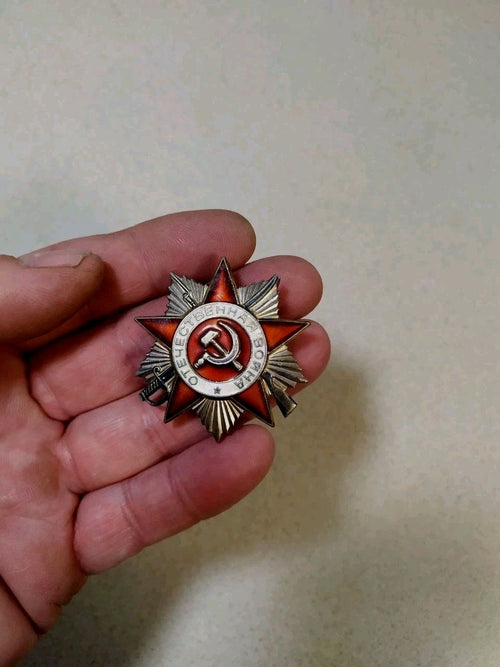 Reverse of the USSR order with mint mark and engraved serial number 3424639