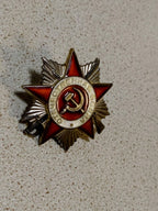 Soviet WW2 award with white enamel ring reading Patriotic War – detail 6