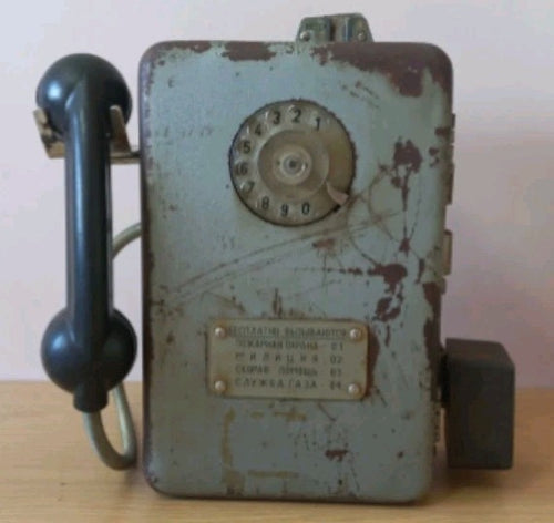 Soviet payphone AMT-47 in gray-green cast iron with Bakelite handset and brass emergency plate