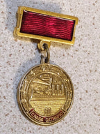 Cruiser Aurora on a USSR badge for 60 years of the October Revolution