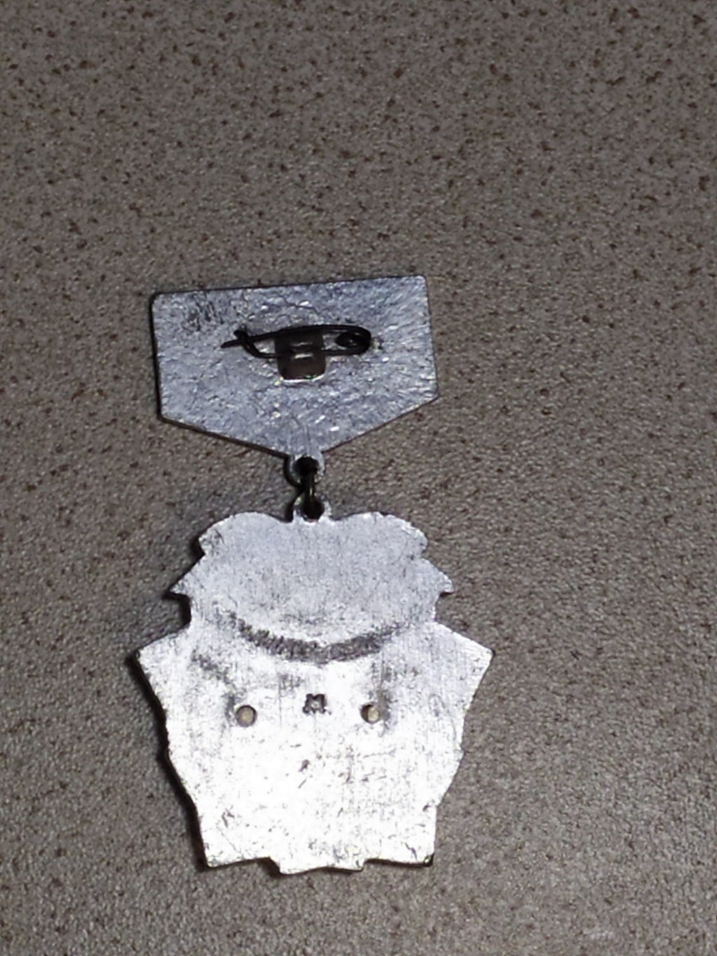 Reverse side of commemorative Soviet 1972 badge