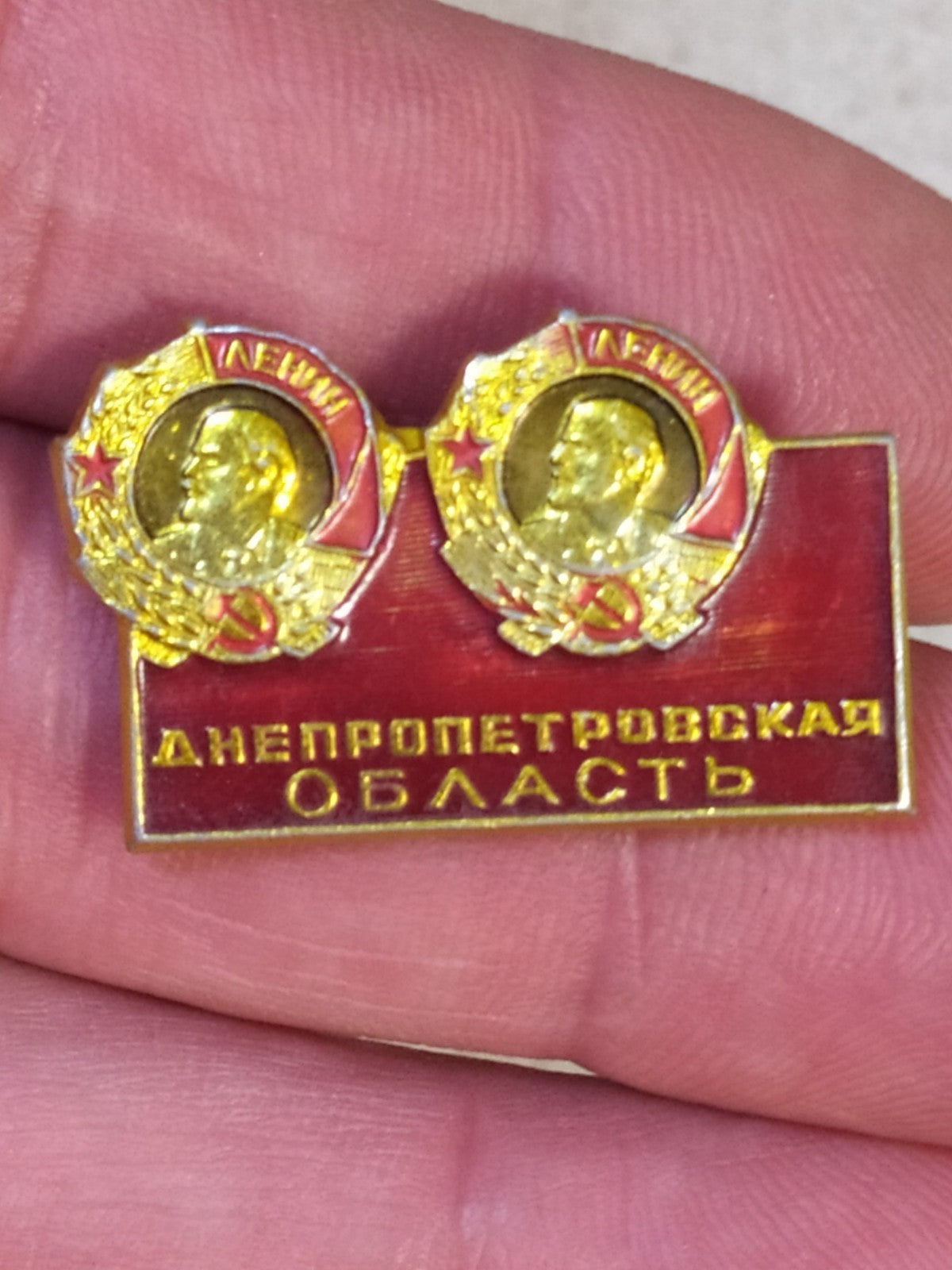Soviet pin from the Dnepropetrovsk Region with two Orders of Lenin