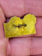 Back of the old Soviet pin badge showing its fastening