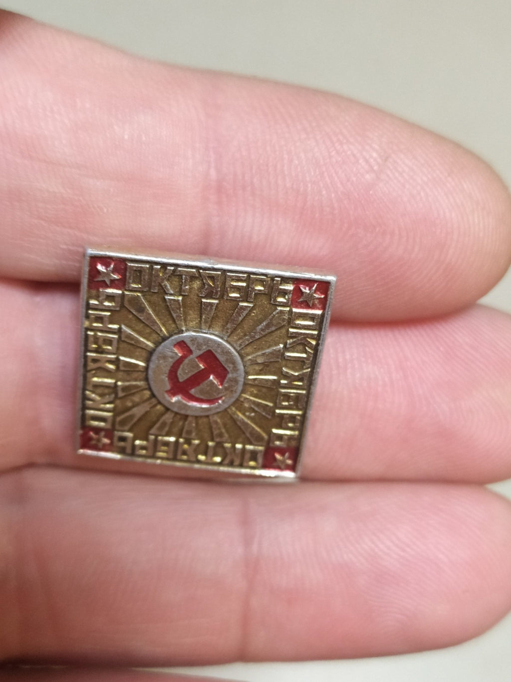 Vintage Soviet October pin, red star detail