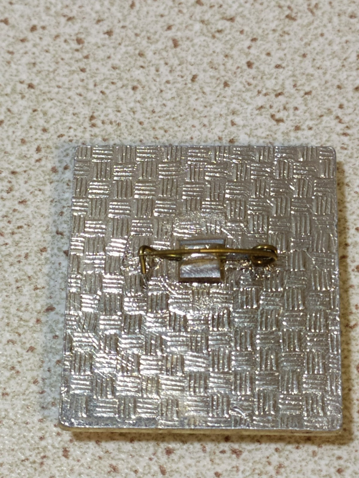 Reverse of the Soviet October Revolution pin