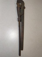 Adjustable pipe wrench made in USSR, close-up of the jaws and thread