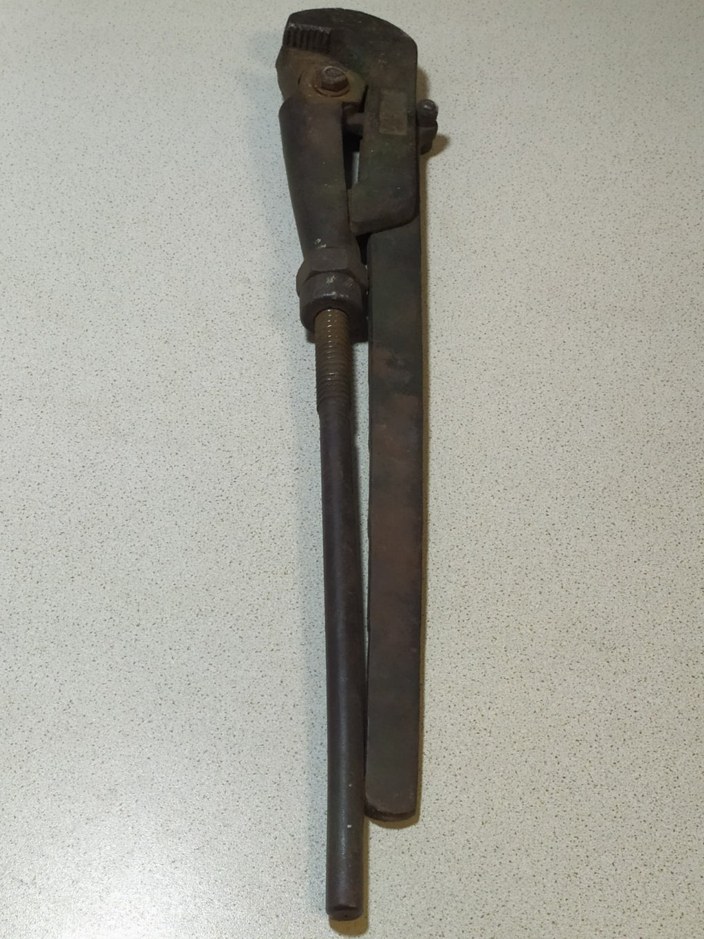Vintage Soviet tools: heavy-duty steel wrench with patina and surface rust