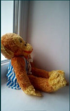 Synthetic plush fur detail of the USSR soft toy monkey