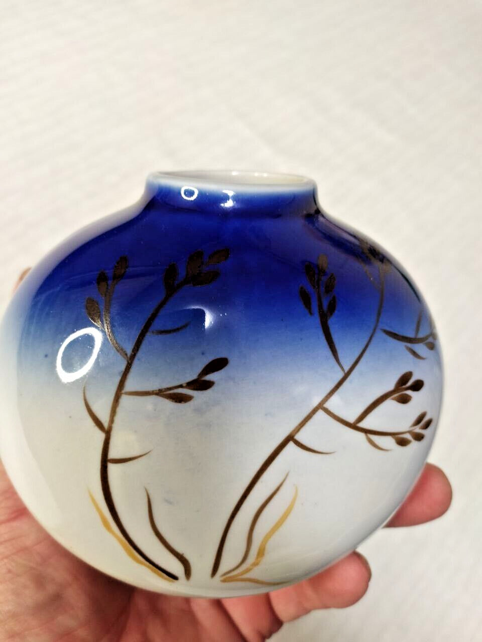 Green factory stamp on the bottom of a Soviet porcelain vase – detail 7