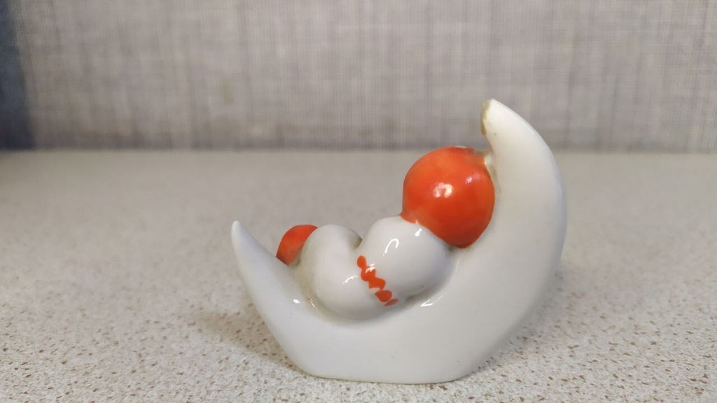 Small factory mark on the bottom of a Soviet porcelain figurine