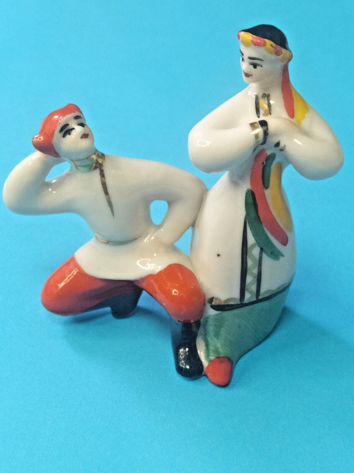 Polonne porcelain dancing couple figurine with red sharovary and floral wreath