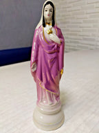 Virgin Mary figurine in purple-pink robe with hand-painted gold trim