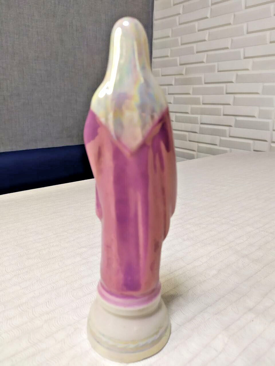 Iridescent luster glaze on the veil of the Polonne porcelain figurine