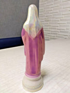 Iridescent luster glaze on the veil of the Polonne porcelain figurine
