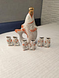 Soviet porcelain fish decanter set from Polonne with six small fish shot glasses