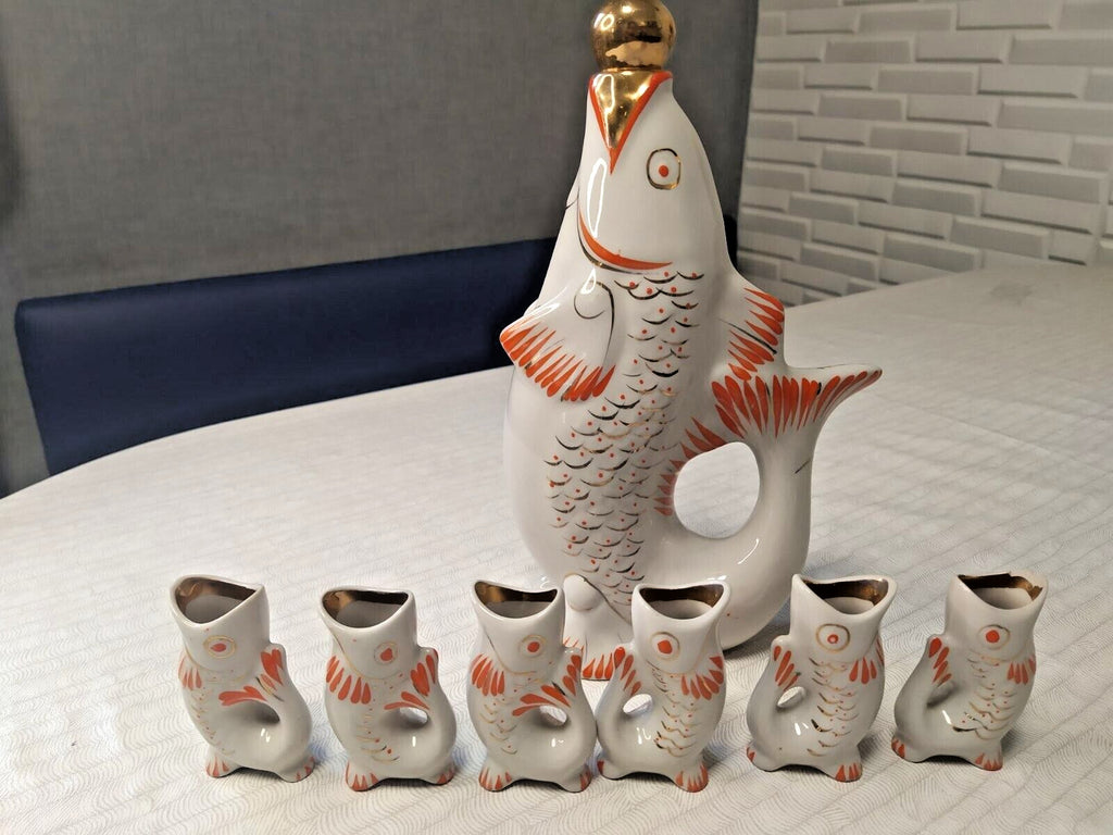 Large porcelain carp decanter with gold-leafed stopper