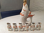 Large porcelain carp decanter with gold-leafed stopper