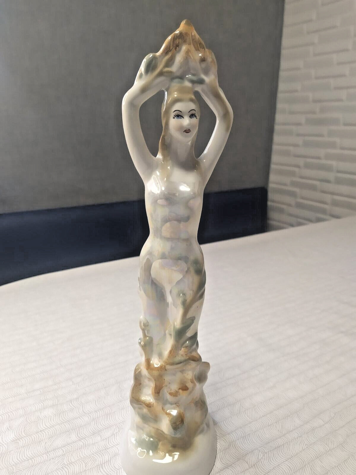 Soviet porcelain figurine of the Mistress of the Copper Mountain with iridescent glaze