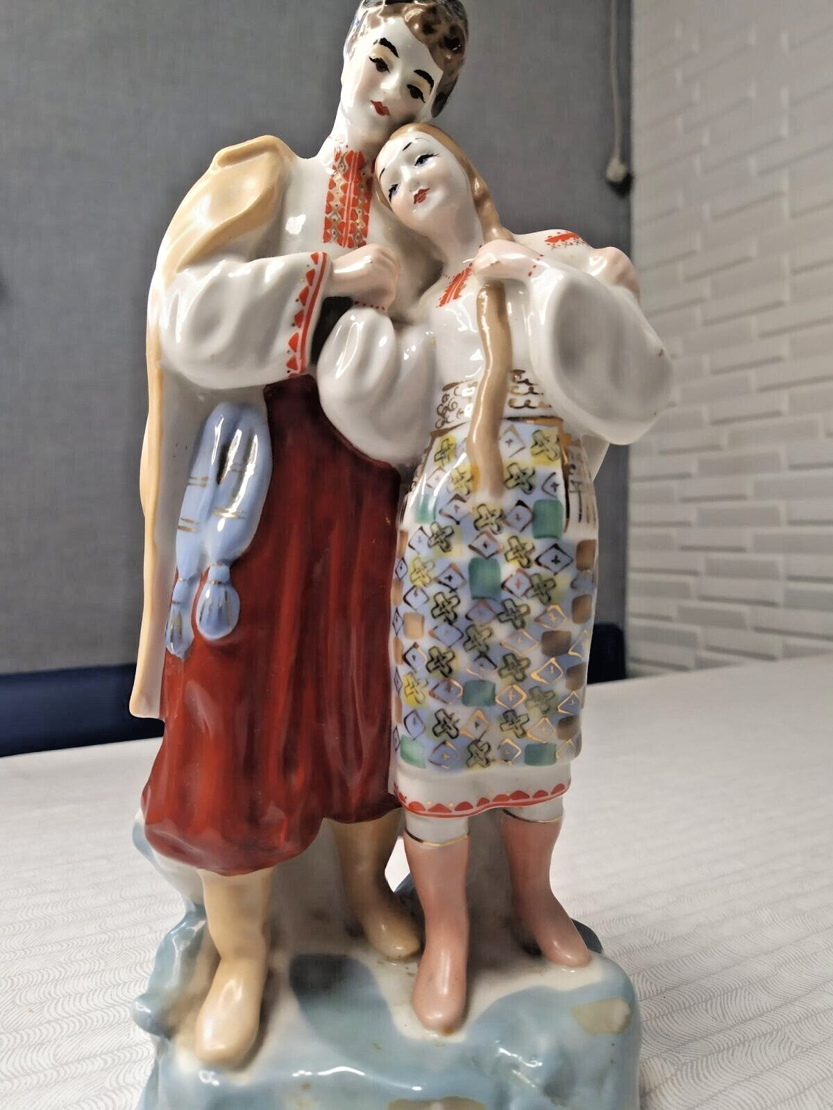 Vintage Soviet Ukrainian lovers porcelain on a shelf