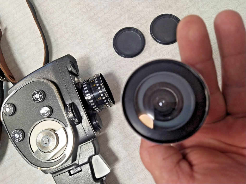 Soviet Quarz-2x8S-1M 8mm movie camera with Meteor-8M zoom lens and pistol grip