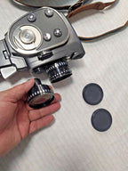 Soviet movie camera with detachable pistol grip and leather case