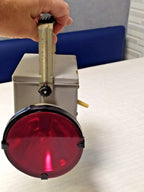 Soviet railway lantern dated 1991 with metal housing, carrying handle and clear main lens
