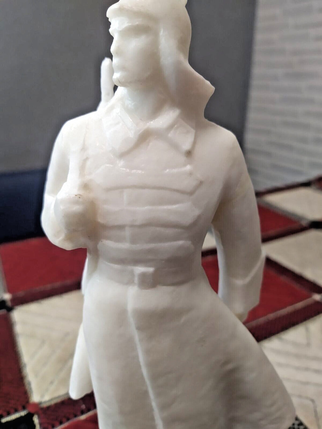 USSR soldier figurine on a flat stable base