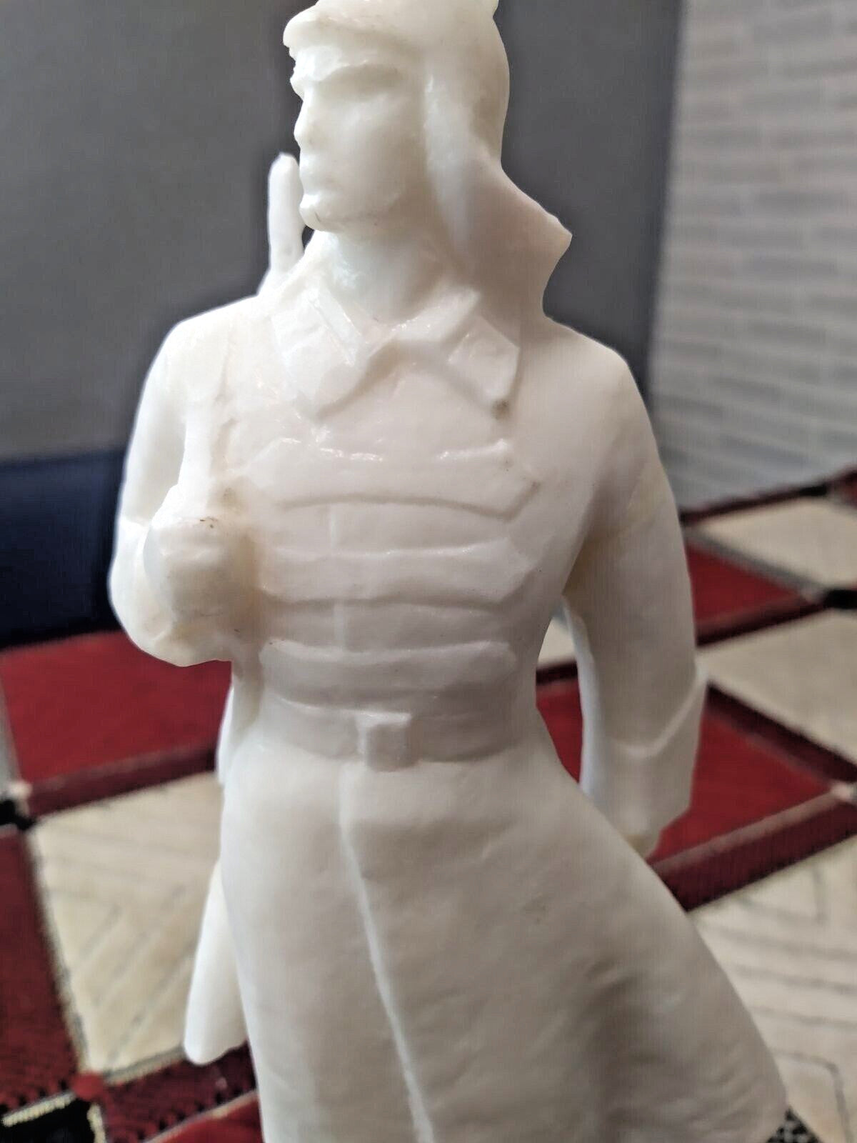 USSR soldier figurine on a flat stable base
