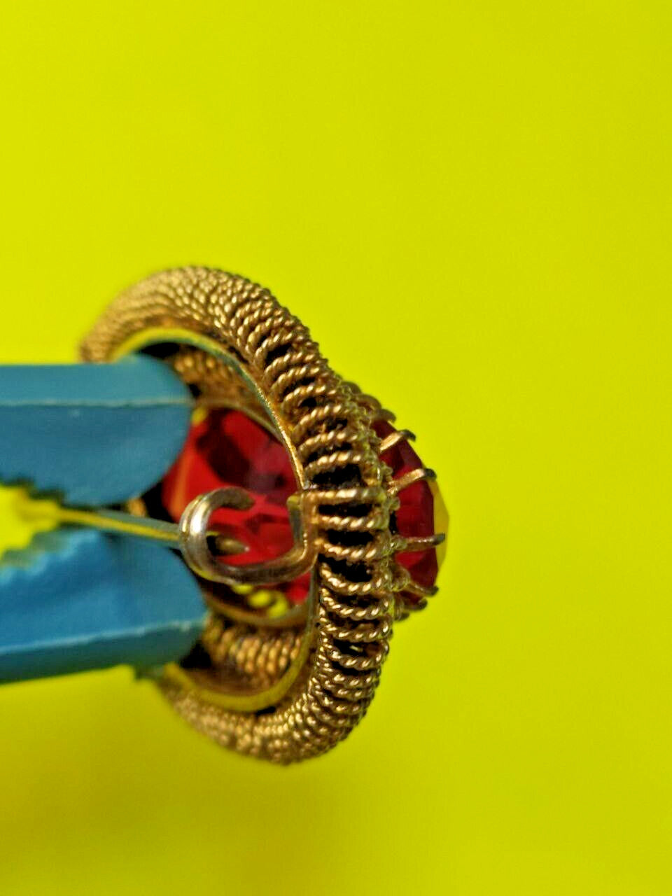 Gilded USSR brooch shown with measuring tape for scale – detail 10
