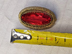 Gilded USSR brooch shown with measuring tape for scale – detail 16