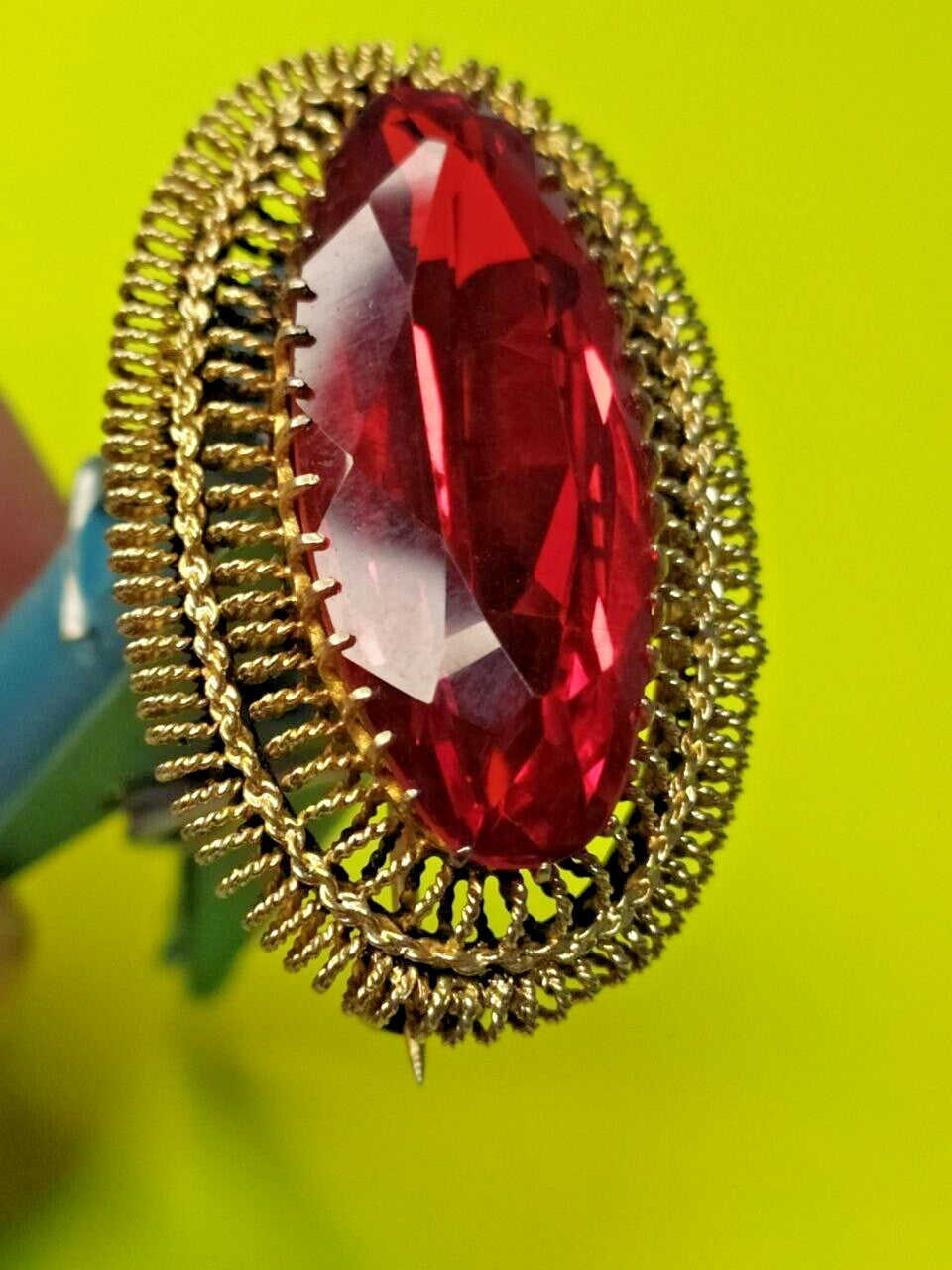 Gilded USSR brooch shown with measuring tape for scale – detail 19