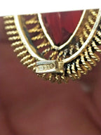 Gilded USSR brooch shown with measuring tape for scale – detail 7