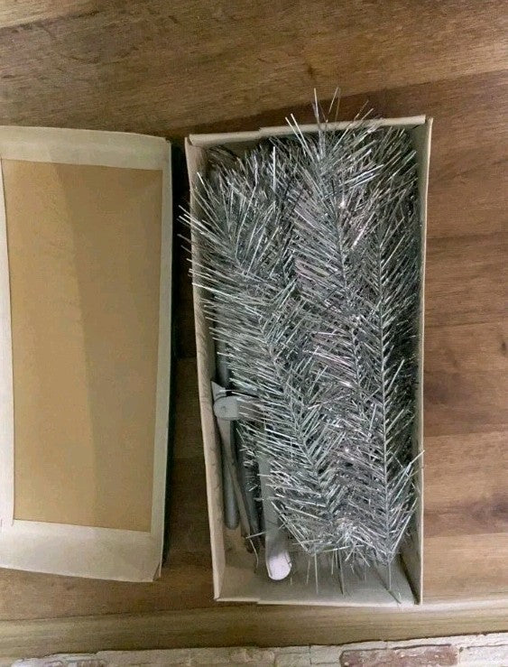 Shiny silver tinsel needles of the vintage Soviet tree