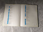 Soviet space memorabilia book page with rocket and orbital station diagrams – detail 23