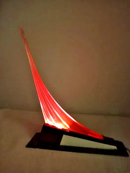 Soviet space rocket night light lamp Vostok with glowing orange-red plexiglass trail
