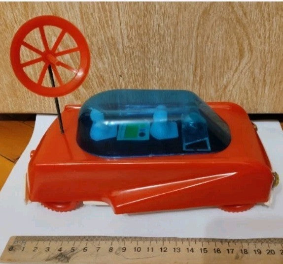 Bottom of the space rover toy with factory logo, 5 rub 50 kop price and OTK stamp